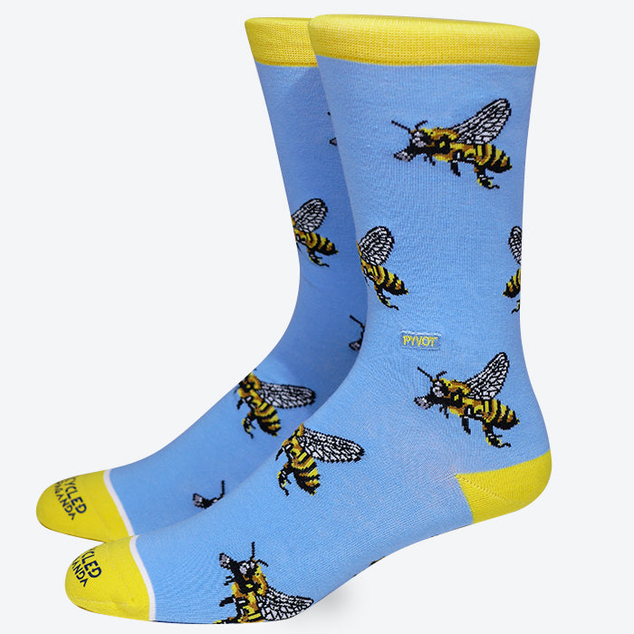 PYVOT Beeware. These Bumble bee pattern socks are made with soft combed cotton. Vibrant hues of blue and yellow yarns make this unique design pop out. Save the bees.