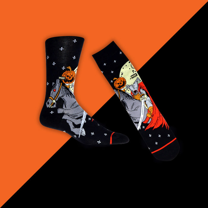 The pumpkin king riding his horse socks. Made with  knitted soft combed cotton and breathable material, these pumpkin horse socks are perfect for halloween, horse riding, or any spooky occasion.