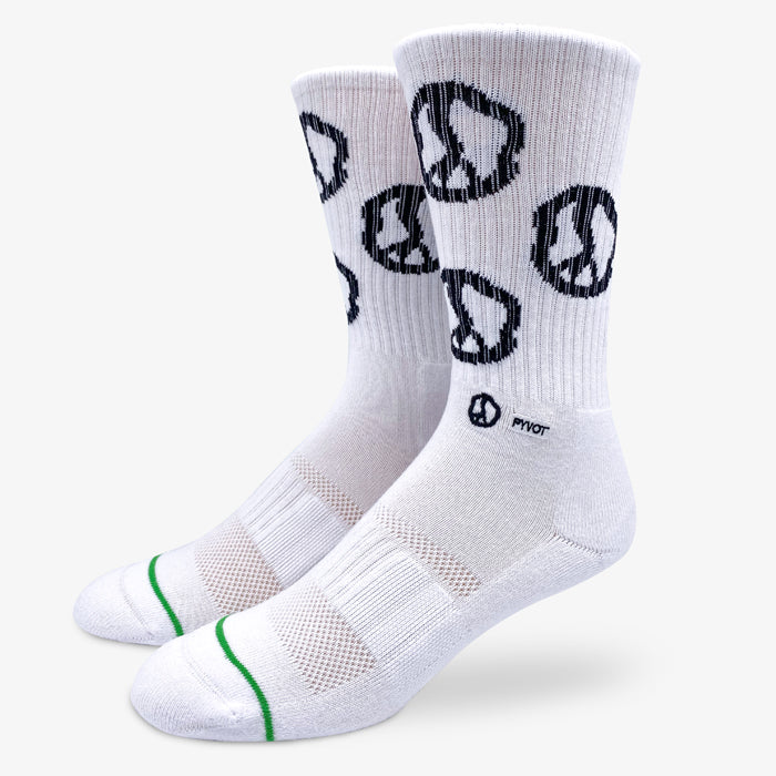 PYVOT Socks White peace sign socks. Made with soft combed cotton, extra arch support, air vents, and anti-microbial silver yarns. Still movin peace sign socks for any occasion.
