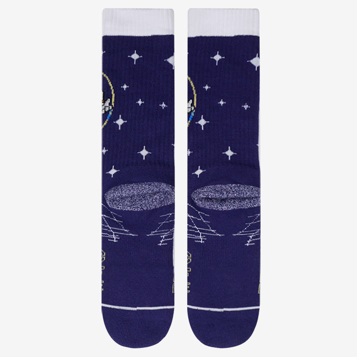 Back side of Space man socks laying flat shows astronaut floating in the stars of space space. Star socks made with premium combed cotton , compression, and arch support. Blue space socks with white highlights and yellow lining. Perfect for all matters space and time..